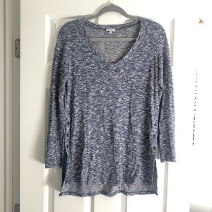 Long sleeve shirt with slits